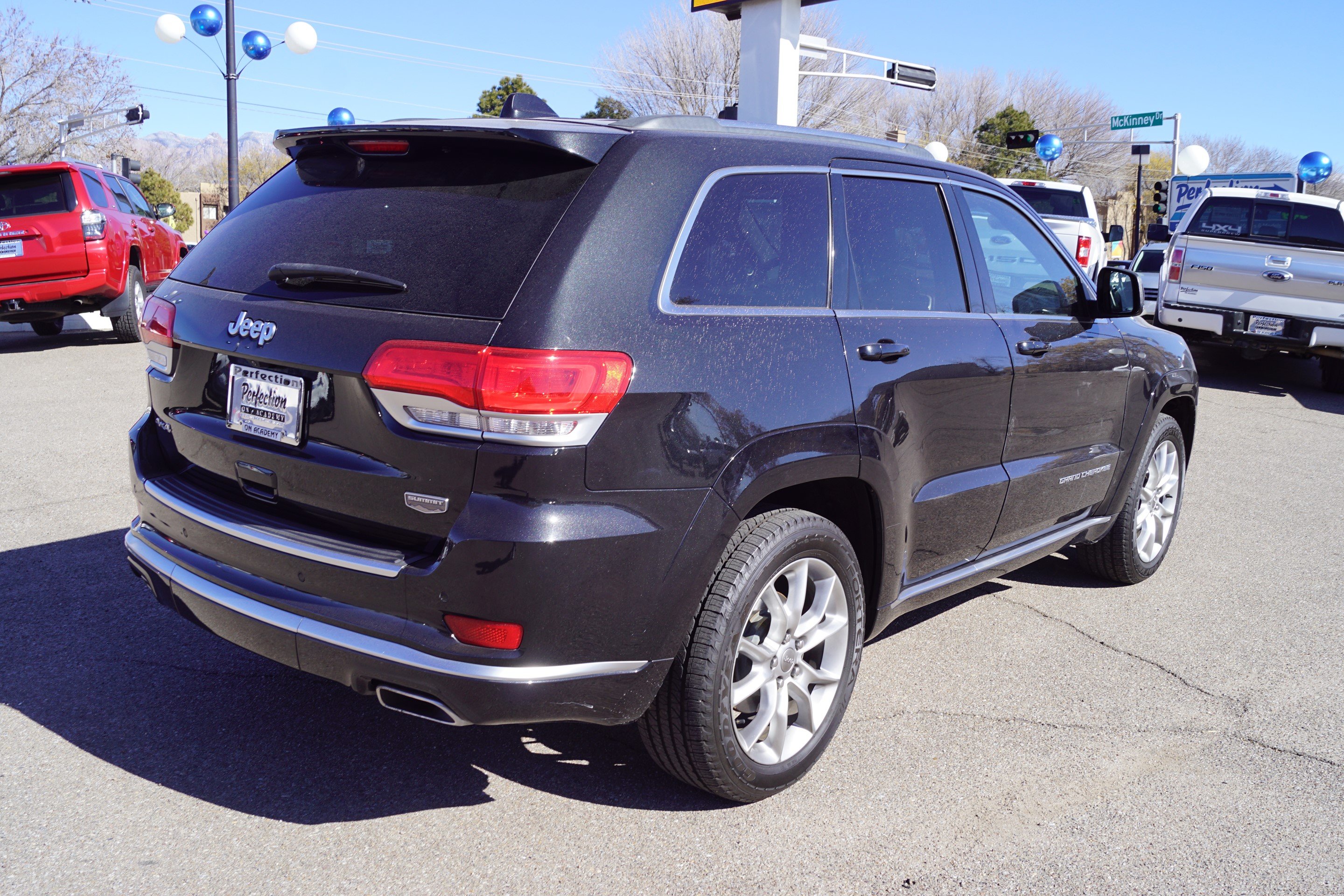 PreOwned 2015 Jeep Grand Cherokee Summit Sport Utility in